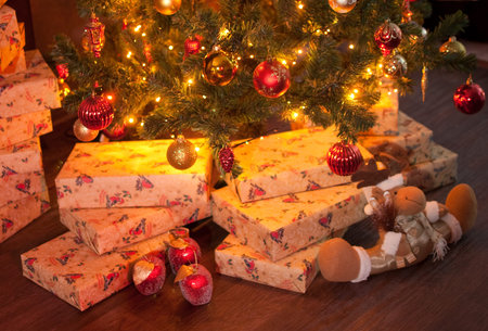 Christmas interior with gift, deer, tree and garland