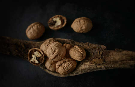 Walnuts on a black background. Walnut.の写真素材