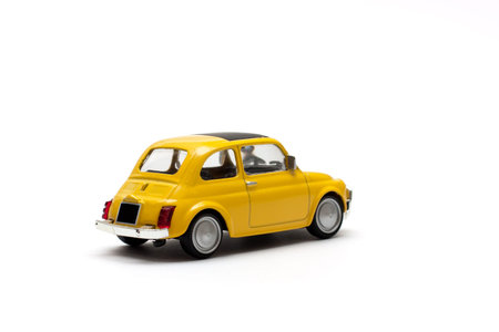 A little model of an old italian car, shooted from behind 