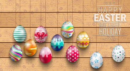 Easter colored eggs on wooden backgroundのイラスト素材