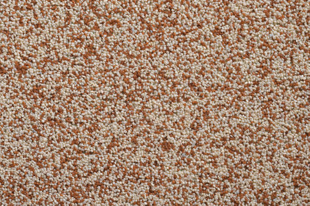Mosaic plaster texture. Decorative plaster based on small colored marble stones