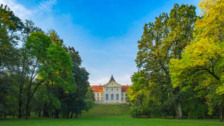 Dzikow Castle (Palace), Tarnobrzeg, Poland-03/10/2020: 15th-century or perhaps a 14th-century castle in neo-baroque style (current). Back view from the park complex during a beautiful morningのeditorial素材
