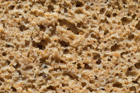 Freshly baked rye bread as texture background. Bread cross-section.の写真素材