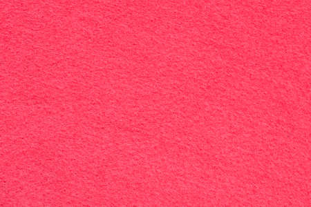 The background of dark pink felt textileの写真素材