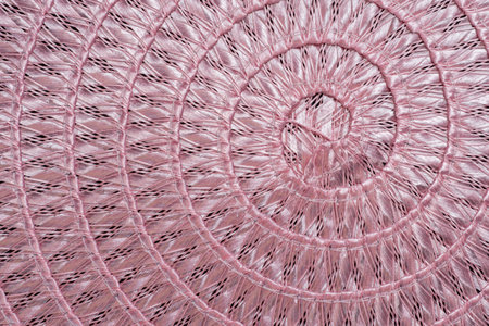 The snail-like pattern obtained by table mat texture.の写真素材