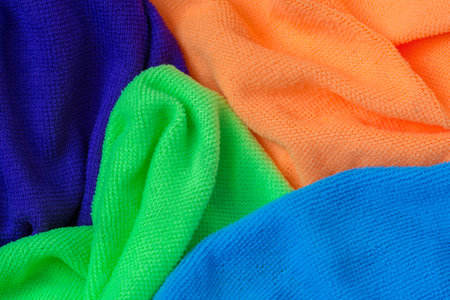 Wrinkled colorful microfiber duster cleaning cloths.