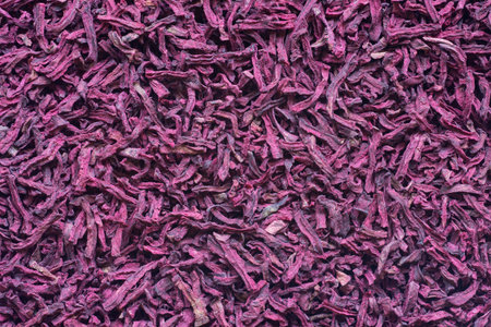 Dried beetroot flakes. Dehydrated edible beets. Food background. Vegetables full of minerals and vitaminsの写真素材