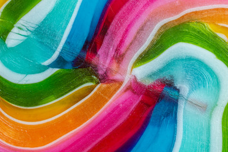 Rainbow swirl lollipop texture. Multicolored abstract full-frame backgroundの写真素材