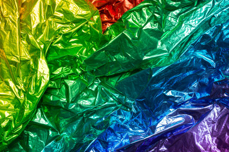 Deflated decorative balloons made of colorful polyester film. Range of colors. Color spectrumの写真素材