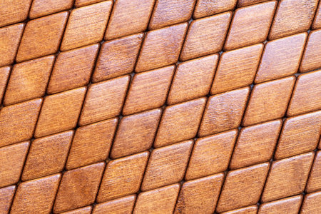 Bamboo rhomb shaped blocks arranged diagonally. Wooden background patternの写真素材