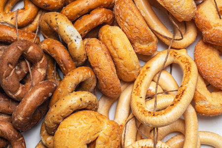 A mix of crunchy Sushki on strings for selling on the street market. Traditional Russian Snackの写真素材