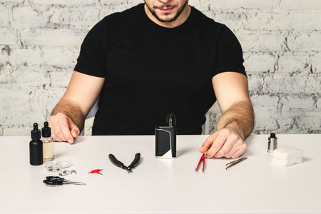 Maintenance of electronic mod vaping device.Modern vaporizer. Start vaping safe ecig vape. Master...