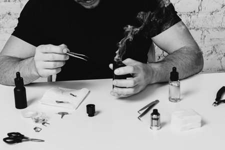 Maintenance of electronic mod vaping device.Modern vaporizer. Start vaping safe ecig vape. Master...