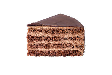Isolated piece of Delicious chocolate layered cake with nougat and biscuit in the cutの写真素材