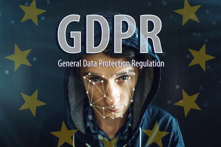 General Data Protection Regulation GDPR . The text with the EU flag in the background of men with personal identification data for facial recognitionの写真素材