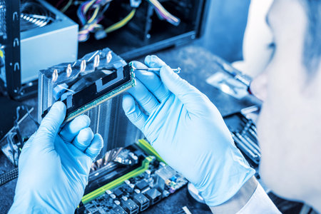 Engineer technician computers in gloves on the hands is reviewing the failure. The concept of high...