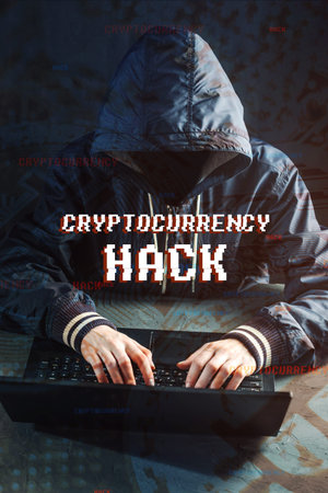 An anonymous hacker without a face is trying to steal cryptocurrency using a computer. Fraud and...
