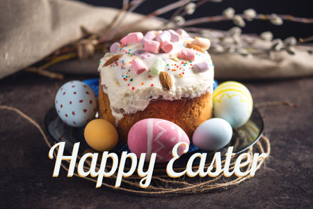 Traditional Easter cake and colorful eggs and text in rustic style on a dark background. Concept...
