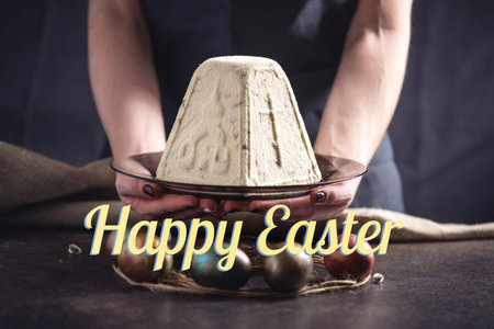 A card with traditional Easter cake and colorful eggs and text in rustic style. Concept happy Easter