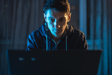 Cybercriminal hacker typing program code while stealing access databases with passwords. The concept...
