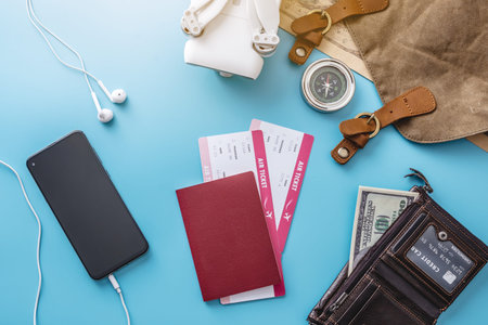 Necessary things for the flight on vacation. Plane tickets, passport, phone, drone quadcopter,...