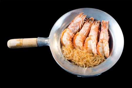 Baked vermicelli with large shrimps served in hot bowl (Goong ob Woon Sen)の写真素材