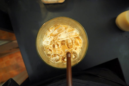 iced coffee looking from top while suckingの写真素材