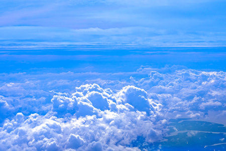 above the cloudy sky shot from aeroplane window