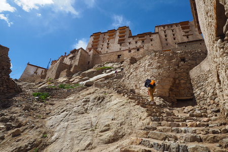 unidentified people hiking up to Leh Palace, Leh - Indiaの写真素材
