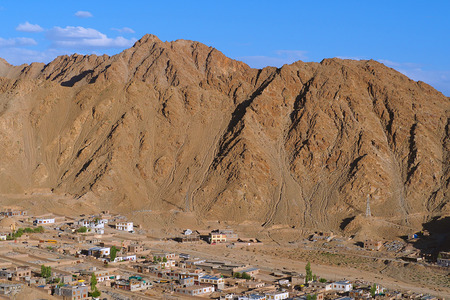 Village build up to the mountain at Leh Ladakh, Indiaの写真素材