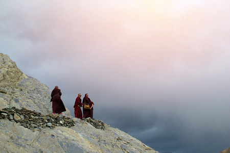 India - JUNE 22 2017: group of Lamas (Buddhist monk) stand at the top of the hill which place that they stay at monastery at Lamayuru Leh India - leave space for copy, textのeditorial素材