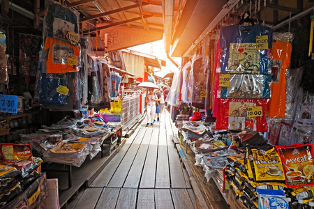 Malaysia - AUGUST 18 2017: Tourists exploring local souvenir shops in Chew Jetty fishing village in Georgetown Penang Malaysiaのeditorial素材