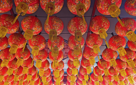 Chinese hanging in a row at templeの写真素材