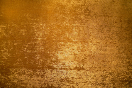 Gold colour velvet fabric background textureの写真素材