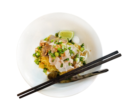 Thai local traditional street food dry noodles with pork called Kuay Teaw Ba Mee Hang isolated on withe backgroundの写真素材