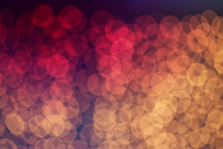 blurred bokeh photography in abstract background pink blue yellow color theme photo tkaen from led panelの写真素材