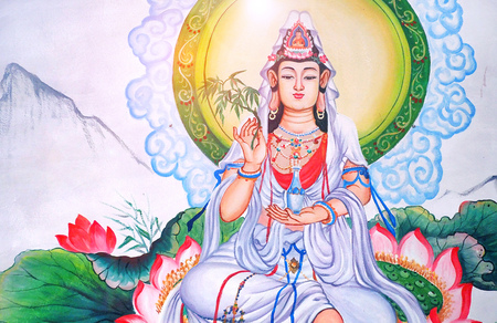 Chiangmai Thailand - 30 JAN 2018: white dress Guan Yin lady chinese god wall paint at local public chinese temple in Fang, Chiangmai, Thailandのeditorial素材