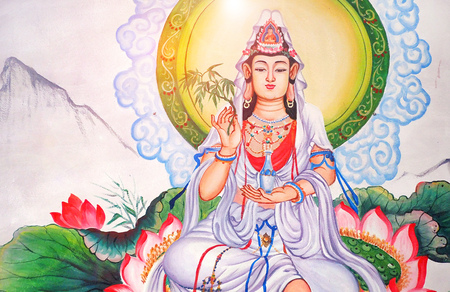 white Guan Yin lady chinese god wall paint at local public chinese temple in Chiangmai Thailand - the Goddess of Mercy and Compassion in the buddhist religionのeditorial素材