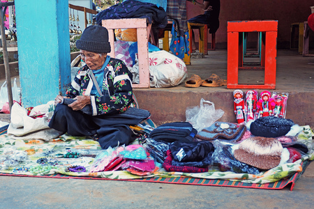 CHIANG MAI THAILAND - 30 January 2018: Old Local Mountain Hmong tribal man in traditional cloth selling souvenir on beside the road at Doi Ang Khang, Fang, Chiang Mai, Thailandのeditorial素材