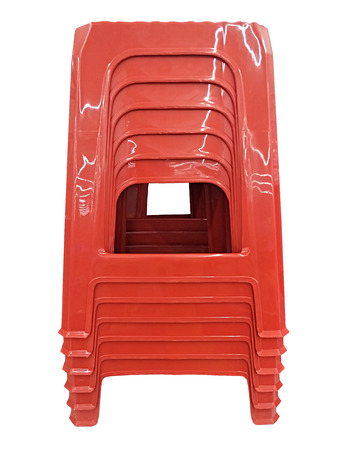 red plastic chair tack on isolated on white background with clipping pathの写真素材