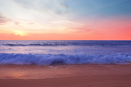 evening beach sunset in pastel sweet dream colorful at Phuket Nai Thon beach in southern of Thailandの写真素材