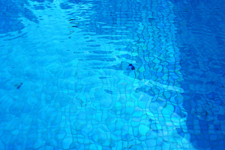 Pool water ripple with nice tile and shadow reflect on surfaceの写真素材
