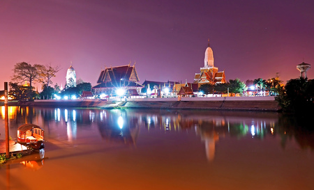 Phutthaisawan temple at night time with reflection on river view from river side at Ayudthaya Thailandの写真素材