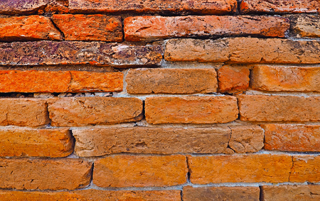 close up ancient brick wall tile surface wallpaper for background conceptual designの写真素材