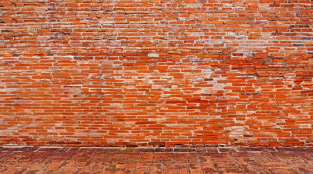 old Ancient brick background with ground brick stone floor tileの写真素材