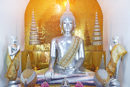 Traditional Thai style white monk Buddha statue inside Public temple in Ayutthaya Thailandの写真素材