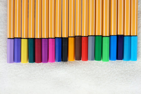 row of multicolored marker pen on white backgroundの写真素材