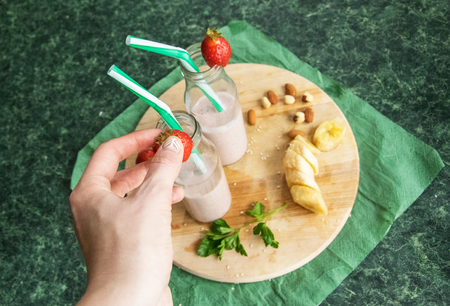 smoothie jar strawberry and banana, mint cocktail healthy foodの写真素材