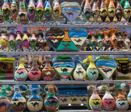 Sand bottles of colored sand camelsの写真素材