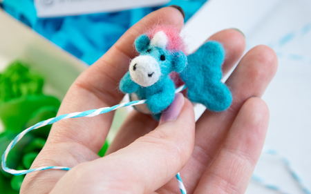 hande made wool toy blue unicorn mini sculpture needle felting.の写真素材